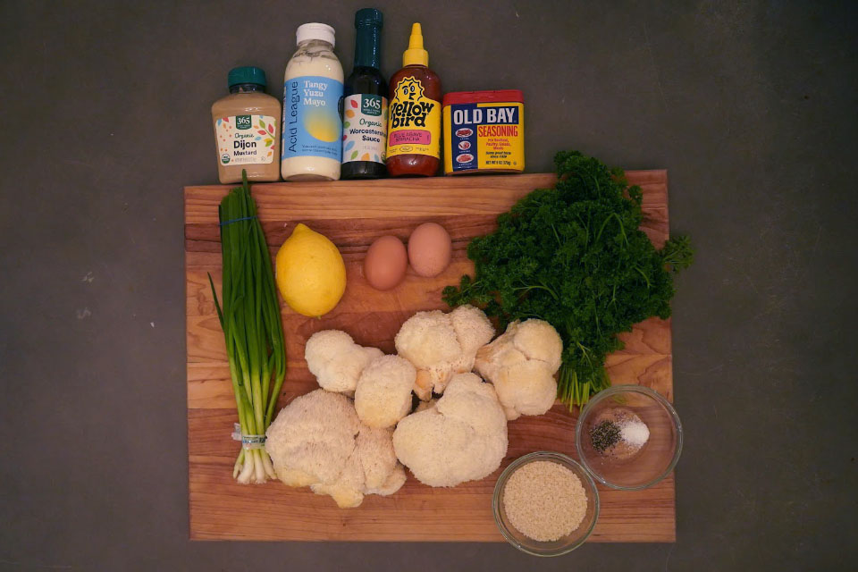 Crab cake ingredients on a cutting board